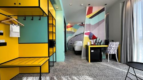 Postel nebo postele na pokoji v ubytování ibis Styles Tbilisi Center