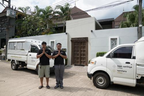two men standing in front of a white van at Narintara Private Pool Villas - Free Tuk-Tuk Service to the Beach! in Ao Nang Beach