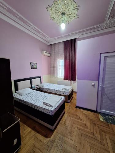 Postel nebo postele na pokoji v ubytování Gold Hotel Batum
