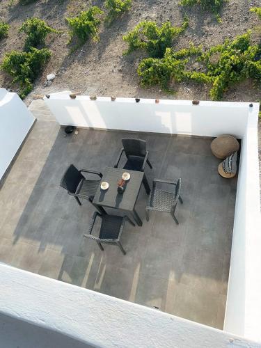 an overhead view of a patio with a table and chairs at Zana's Villa-Sandra in Akrotiri