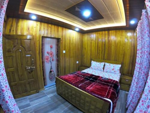 Postel nebo postele na pokoji v ubytování Gyalsang Homestay