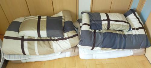 Postel nebo postele na pokoji v ubytování Clear Up Guest House