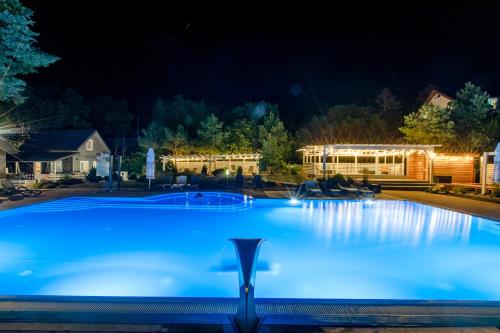 Bazén v ubytování APARTAMENTY przy plaży z basenem z podgrzewaną wodą i mini SPA - Ośrodek Kolonijno-Wczasowy Mewa nebo v jeho okolí