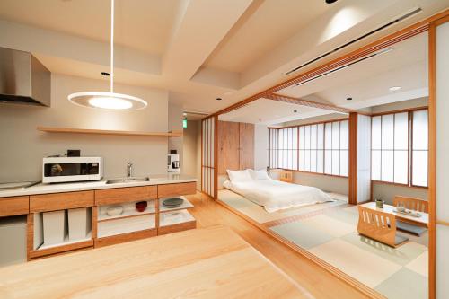 a room with a kitchen and a living room at Solvana Akasaka in Tokyo