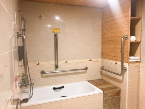 Koupelna v ubytování Doitsu Hotel