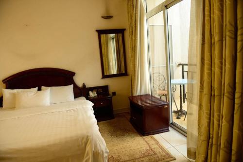 Ένα ή περισσότερα κρεβάτια σε δωμάτιο στο Enjoy the amenities offered by this Suite