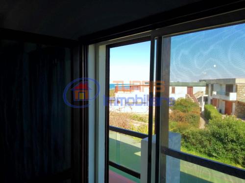 a window in a room with a view at I Mirti in Stintino