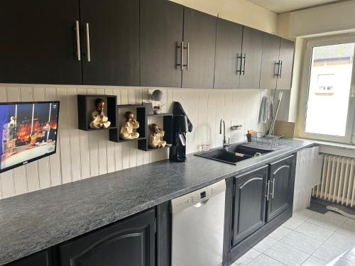 Køkken eller tekøkken på Chambre rénovée dans appartement de 70m2