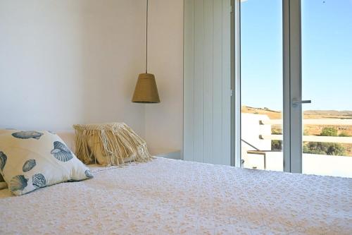 Кровать или кровати в номере Evridiki apartments