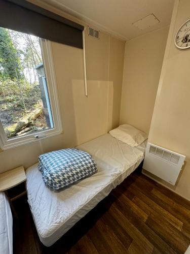 Postel nebo postele na pokoji v ubytování Au cœur des Pins