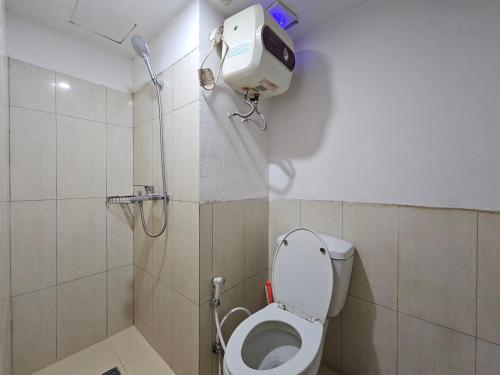 Ένα μπάνιο στο The Jarrdin Apartment Hotels by Ironman