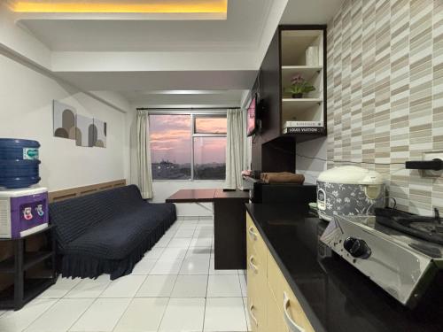 Η κουζίνα ή μικρή κουζίνα στο The Jarrdin Apartment Hotels by Ironman