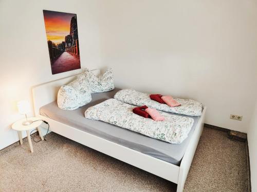 Postel nebo postele na pokoji v ubytování L7 - Urlaubsmagie - Kleine Wohnung am Wanderweg