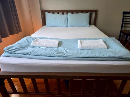 Ein Bett oder Betten in einem Zimmer der Unterkunft Chill @ Phetchaburi