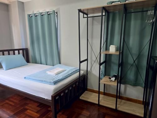 Ein Bett oder Betten in einem Zimmer der Unterkunft Chill @ Phetchaburi