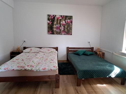 Postel nebo postele na pokoji v ubytování Chatka Kurki