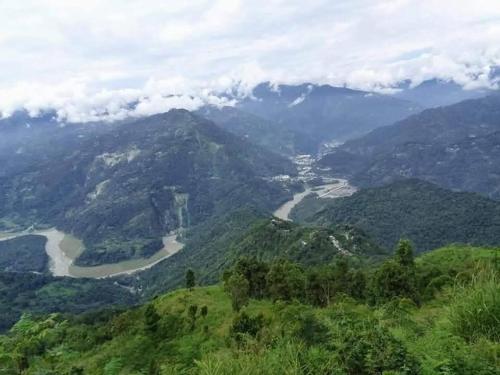 a view of the mountains from the top of a mountain at Rehan Homestay in Pedong