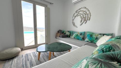 Postel nebo postele na pokoji v ubytování Psarou Summer Villas