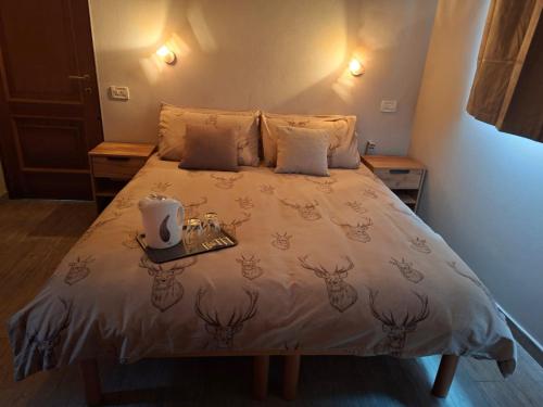 Postel nebo postele na pokoji v ubytování Agli Chalet