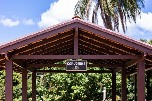 a pavilion with a sign that reads campillian at Villaggio dos Pássaros in Paranoá