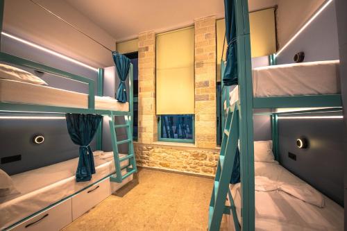 Postel nebo postele na pokoji v ubytování Vega 43 Hostel