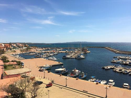 a harbor filled with lots of boats in the water at Hotel Don Pedro in Portoscuso