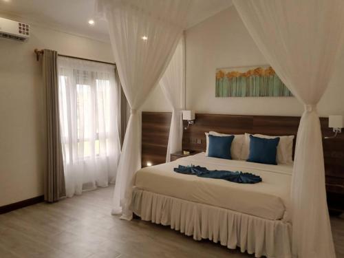 Postel nebo postele na pokoji v ubytování Lukenya Alkebu Resort