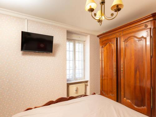 TV a/nebo společenská místnost v ubytování Holiday Home La Grève by Interhome