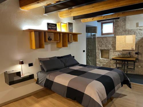 Postel nebo postele na pokoji v ubytování San Pietro Fuori le Mura B&B