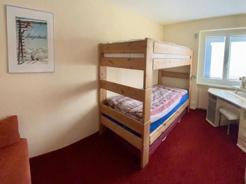 Postel nebo postele na pokoji v ubytování Apartment Haus Colani Ingold by Interhome