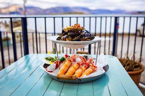 a plate of food on top of a table at The Pierhouse Hotel in Port Appin