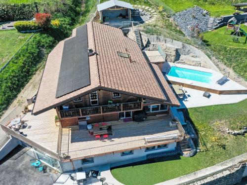 an overhead view of a house with a swimming pool at Apartment Lau'tentik by Interhome in Monthey