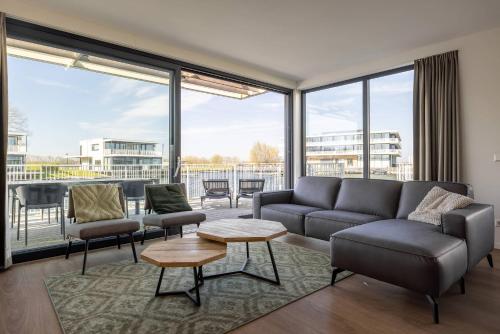 Χώρος καθιστικού στο Hello Zeeland - Veerse Wende - Lamsoor 11