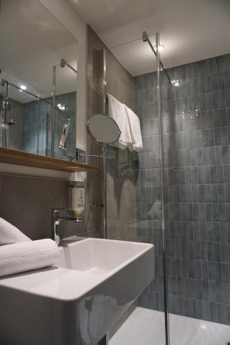 Koupelna v ubytování Dom-Hotel