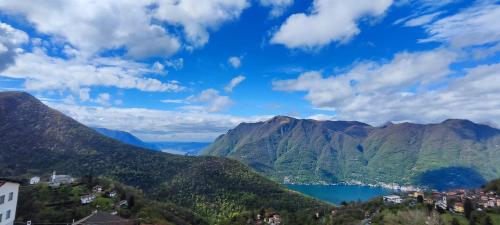 a view of a mountain valley with a lake at Ristorante Bellavista con Locanda in Veleso