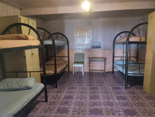 Postel nebo postele na pokoji v ubytování Dorm teriang