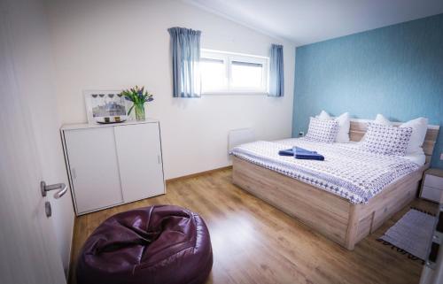 Postel nebo postele na pokoji v ubytování Apartments Relax