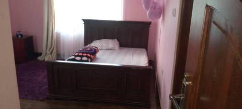 Krevet ili kreveti u jedinici u okviru objekta Sauda Homestay