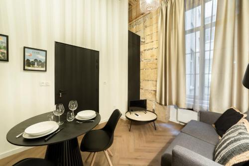 Foto Cosy Opéra - Studio avec Balnéo et clim à Lyon 3