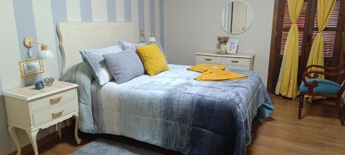 Ein Bett oder Betten in einem Zimmer der Unterkunft Mikaela Segunda-planta sin ascensor