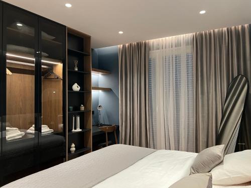 Krevet ili kreveti u jedinici u okviru objekta New Chic Apartment, Central