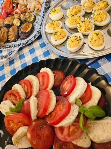 a table with two plates of food with eggs at Gasthof goldener Engel in Kemnath