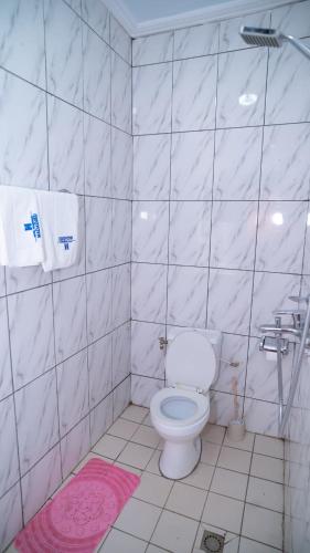 Ein Badezimmer in der Unterkunft Hotel Residence Madadjeu