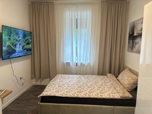 Ένα ή περισσότερα κρεβάτια σε δωμάτιο στο Modernes Zimmer in Zentrale Lage von Mannheim