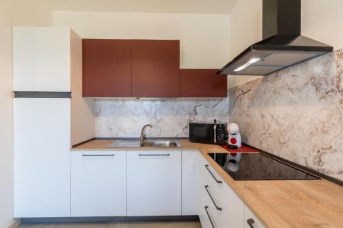 Kuchyň nebo kuchyňský kout v ubytování Relais Val del Tei