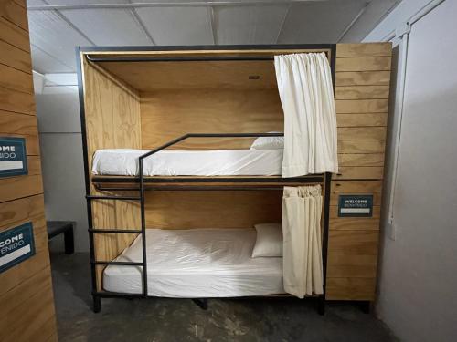 a couple of bunk beds in a room at The Boat House Cancun in Cancún