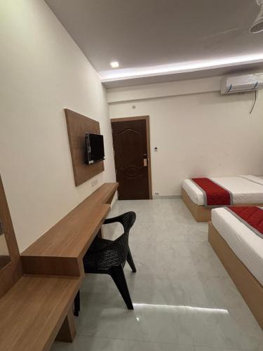 Cama o camas de una habitación en Mirage Suites