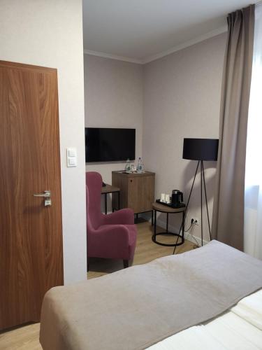 TV o dispositivi per l'intrattenimento presso Hotel Topaz Poznań Centrum