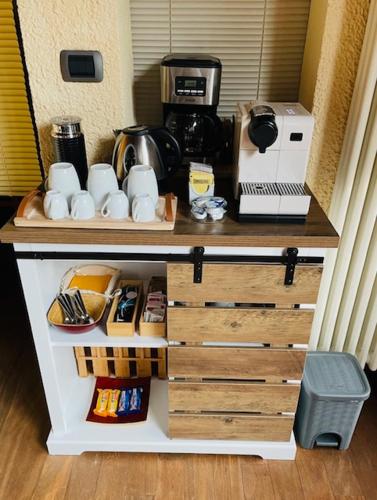 a counter with a coffee maker on top of it at Podere Boschetto R&B in Bologna