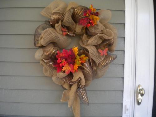 a wreath on the side of a house at Fleetwood House Bed and Breakfast in Portland